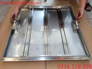 Phần tay cầm của nắp bể nước